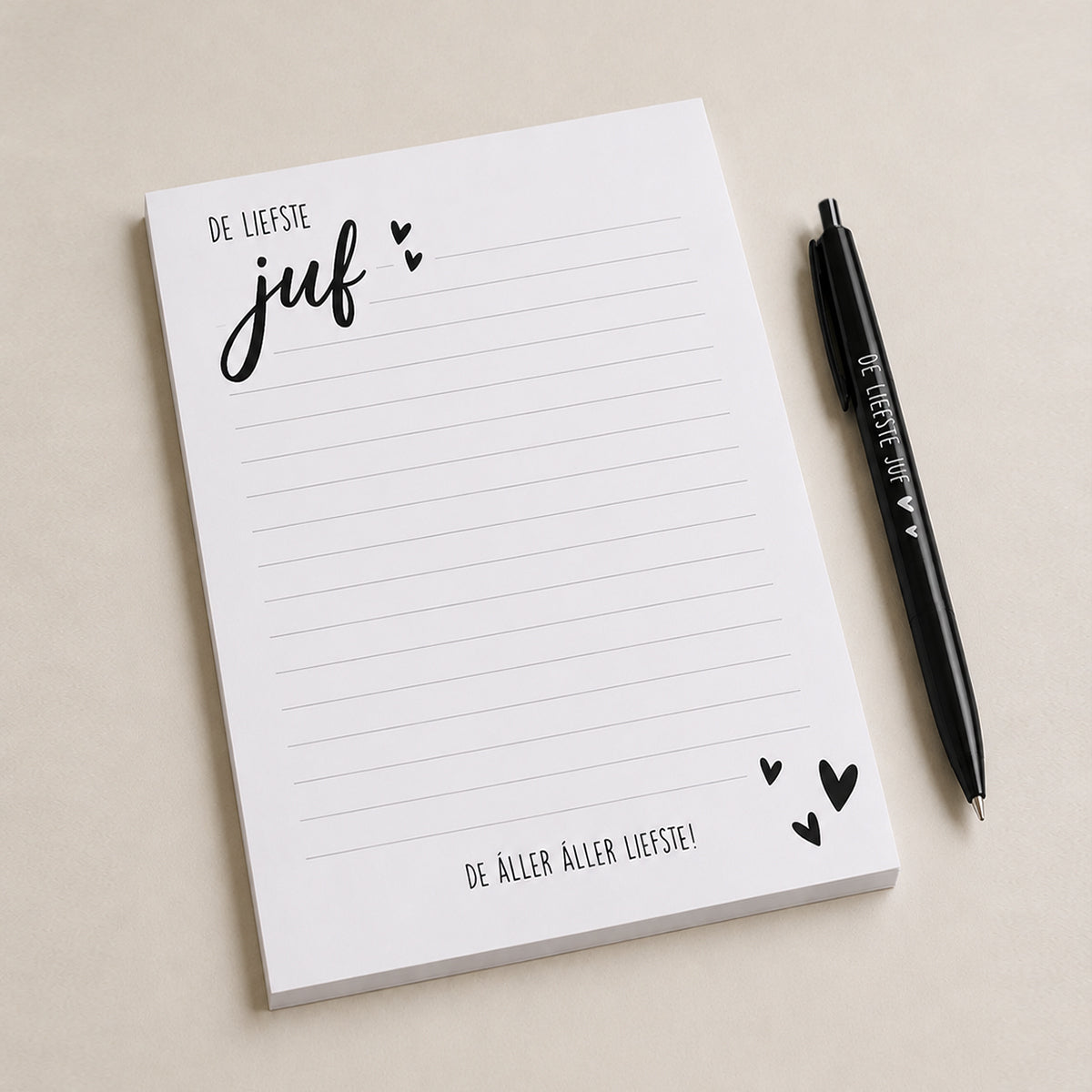 juffenbedankje met notitieblok en pen